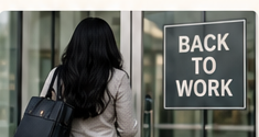 Person returning to work with a back to work sign